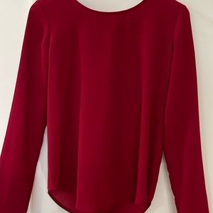 Beautiful light shirt. Size M  wonderful back detail